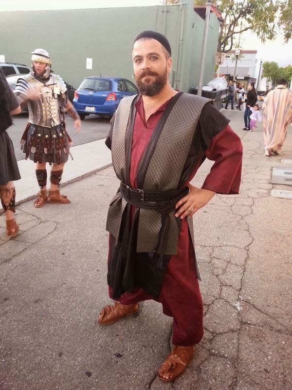 Man in medieval costume on film set