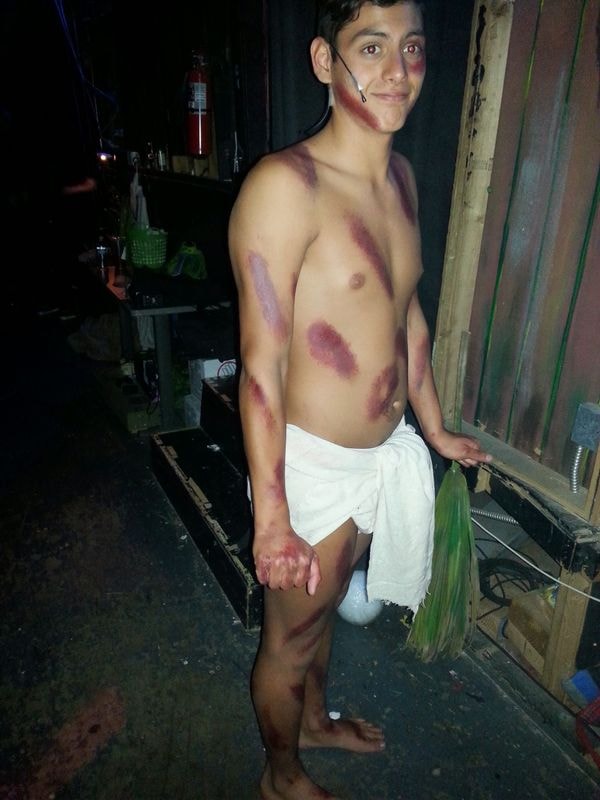 Young man with bruises body makeup
